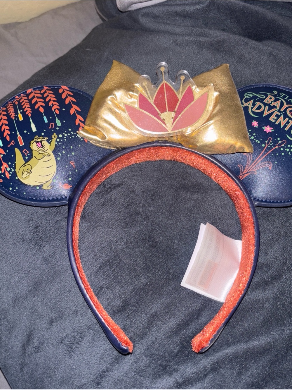 Disney Navy Ear Headband with Gold Bow and Pink Lotus Accent